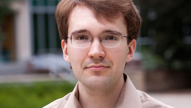 Ein junger Mann mit Roten Haaren und Brille. Ein junger Mann mit Roten Haaren und Brille.