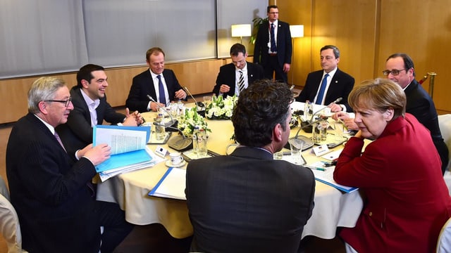 EU-Vertreter an einem ovalen Tisch EU-Vertreter an einem ovalen Tisch