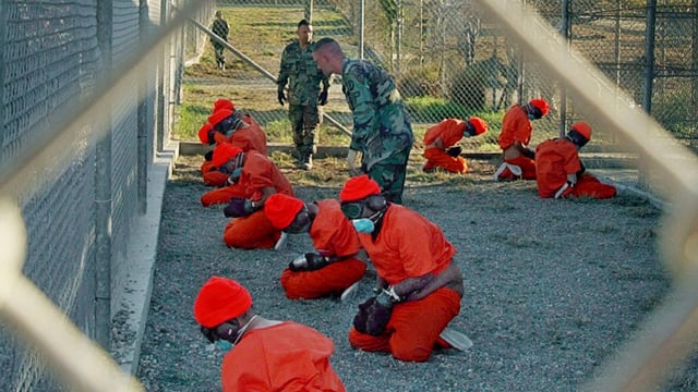 Gefangene in Guantanamo im Januar 2002. Gefangene in Guantanamo im Januar 2002.
