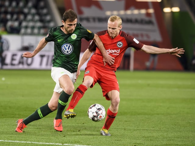 Admir Mehmedi in duel with Sebastian Rode. Admir Mehmedi in duel with Sebastian Rode.