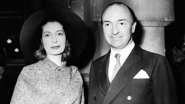 John Profumo (r.) und Ehefrau Valerie Hobson. John Profumo (r.) und Ehefrau Valerie Hobson.