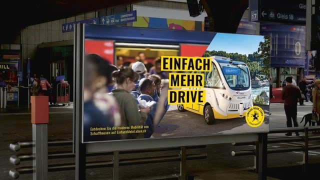 Ein Plakat auf den man einen selbstfahrenden Bus sieht und den Slogan «Mehr Drive». Ein Plakat auf den man einen selbstfahrenden Bus sieht und den Slogan «Mehr Drive».