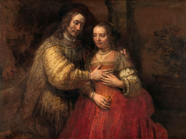 Ein Mann und eine Frau auf einem Rembrandt-Gemälde. Ein Mann und eine Frau auf einem Rembrandt-Gemälde.
