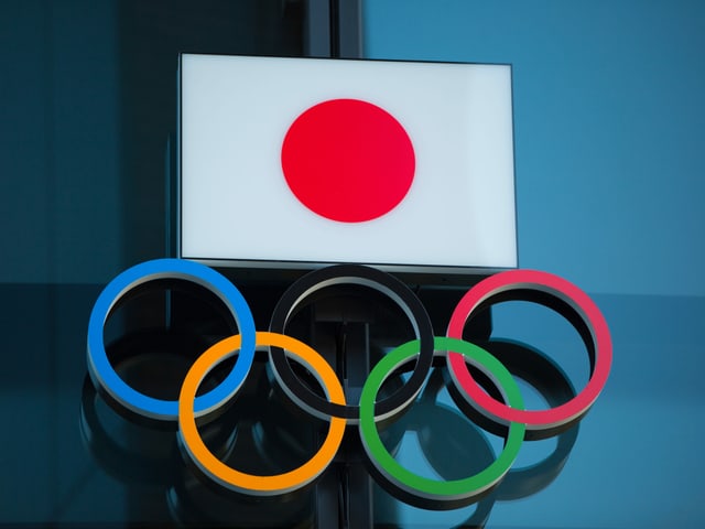 Japan-Flagge und Olympische Ringe Japan-Flagge und Olympische Ringe