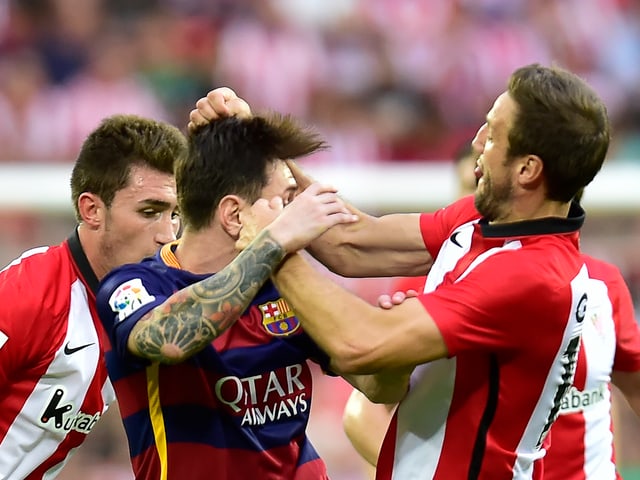Lionel Messi mit Carlos Gurpegui