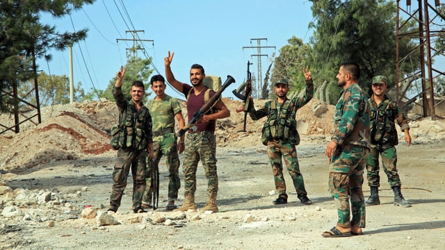 Kämpfer der syrischen Regierungstruppen in Aleppo. Sie drängten die Rebellen in der Stadt zurück. 
