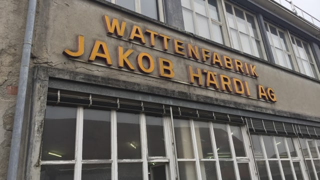 Wattenfabrik von aussen mit Schriftzug Wattenfabrik von aussen mit Schriftzug
