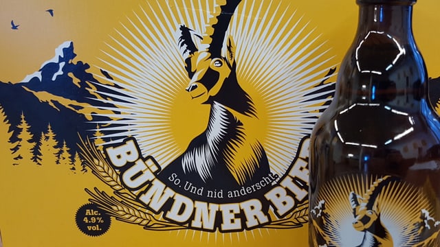 Il logo da la bieraria Grischuna cun ina buttiglia. Il logo da la bieraria Grischuna cun ina buttiglia.
