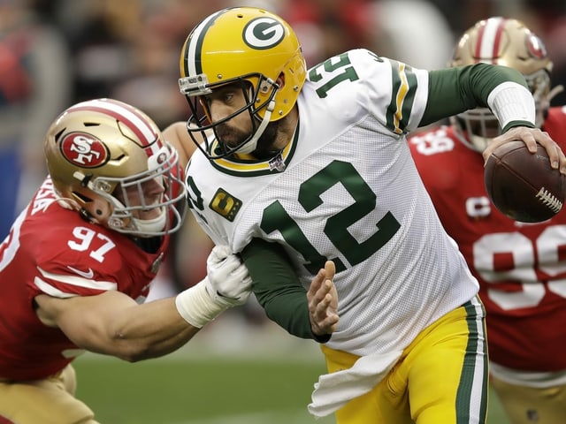 Green-Bay-Quarterback Aaron Rodgers (Mitte). Green-Bay-Quarterback Aaron Rodgers (Mitte).