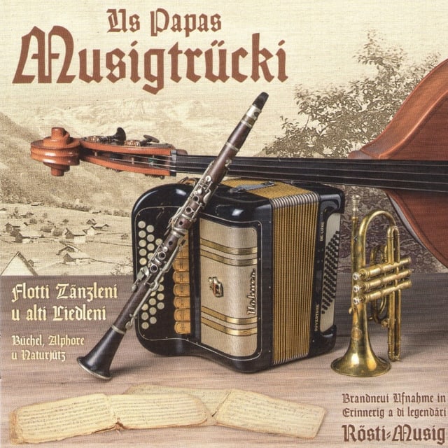 Klarinette, Handharmonika, Bassgeige und Cornett auf einem Plattencover. Klarinette, Handharmonika, Bassgeige und Cornett auf einem Plattencover.