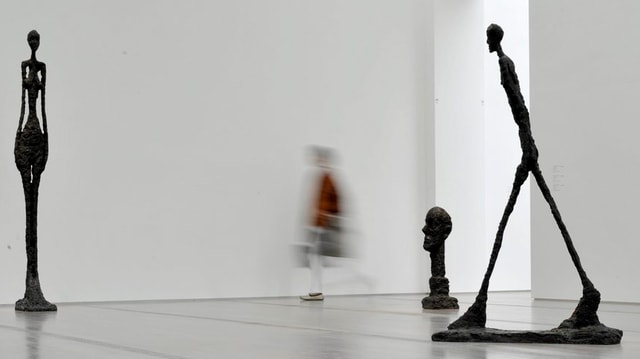 Ovras dad Alberto Giacometti: 'Grande Femme III', 'Grande Tête' e 'Homme qui marche II'. Ovras dad Alberto Giacometti: 'Grande Femme III', 'Grande Tête' e 'Homme qui marche II'.