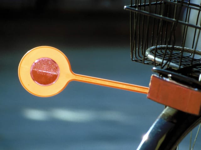 orange Velokelle als Abstandhalter