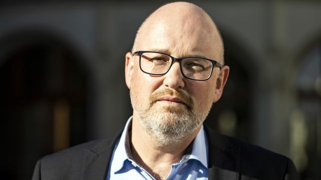 SMPA-Präsident Christoph Bill trägt eine Brille und hat eine Glatze. Er trägt ein blaues Hemd und ein Jacket. SMPA-Präsident Christoph Bill trägt eine Brille und hat eine Glatze. Er trägt ein blaues Hemd und ein Jacket.