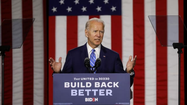 Joe Biden an einem Rednerpult vor einer USA-Flagge. Joe Biden an einem Rednerpult vor einer USA-Flagge.