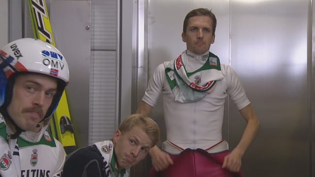 Simon Ammann und Co. warten auf den Entscheid der Jury. Simon Ammann und Co. warten auf den Entscheid der Jury.