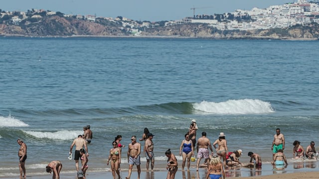 Menschen am Strand Menschen am Strand
