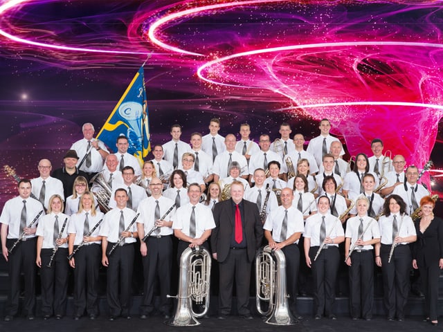 Die Melodia Goldach in Weissen Hemden mit Fahne Die Melodia Goldach in Weissen Hemden mit Fahne