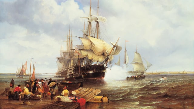 Ein altes Schiff auf dem Meer. Am Ufer laden und entladen Leute ihre Waren. Ein altes Schiff auf dem Meer. Am Ufer laden und entladen Leute ihre Waren.