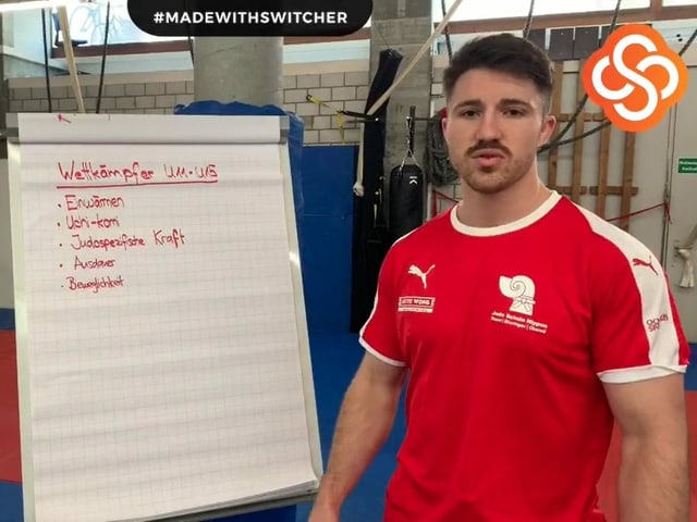 Florian Droux, Judo Trainer vor Tafel Florian Droux, Judo Trainer vor Tafel
