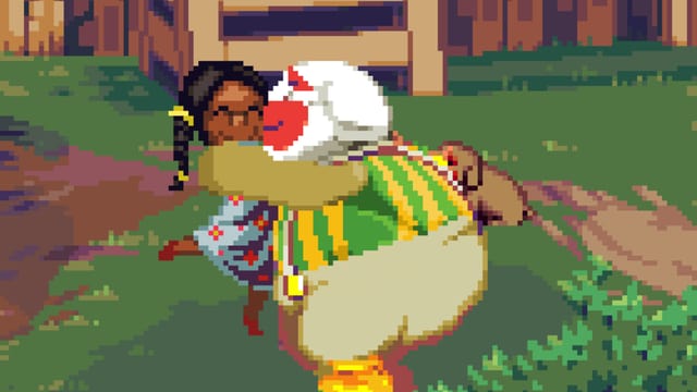 Ein Clown umarmt ein kleines Mädchen Ein Clown umarmt ein kleines Mädchen