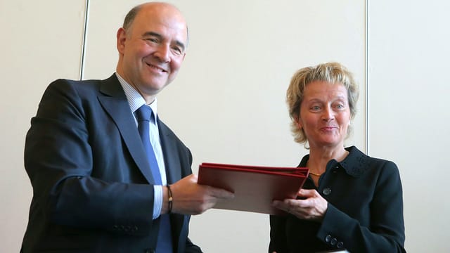 Eveline Widmer-Schlumpf und Pierre Moscovici Eveline Widmer-Schlumpf und Pierre Moscovici