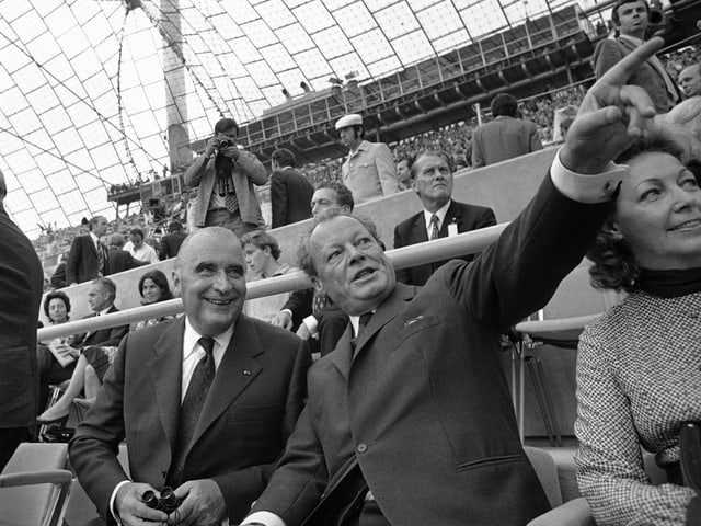 Bundeskanzler Willy Brandt und Frakreichs Präsident Georges Pompidou an den Olympischen Spielen 1972 in München. (keystone)