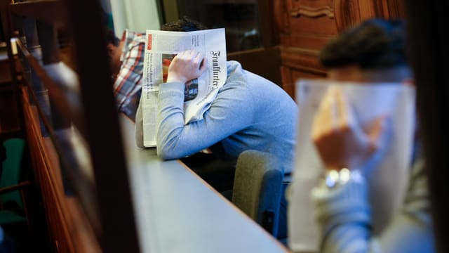Angeklagte im Prozess. Angeklagte im Prozess.