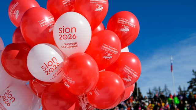 Luftballone mit dem Aufdruck «Sion 2026» Luftballone mit dem Aufdruck «Sion 2026»