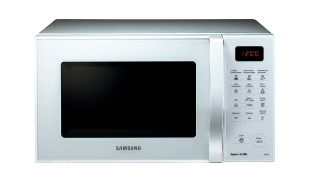 Eine Mikrowelle von Samsung, rechts: Türöffner, Digitalanzeige, Druckknöpfe. Eine Mikrowelle von Samsung, rechts: Türöffner, Digitalanzeige, Druckknöpfe.