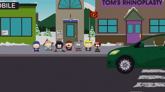 Grünes Auto im Vordergrund, im Hintergrund Kids mit runden Köpfen. Grünes Auto im Vordergrund, im Hintergrund Kids mit runden Köpfen.