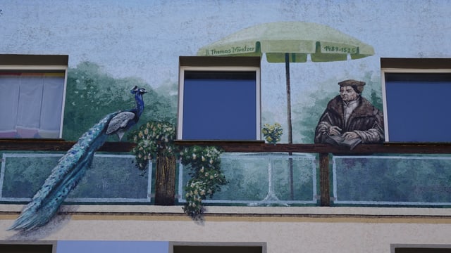 Thomas Müntzer wurde auf eine Hauswand gemalt. Thomas Müntzer wurde auf eine Hauswand gemalt.