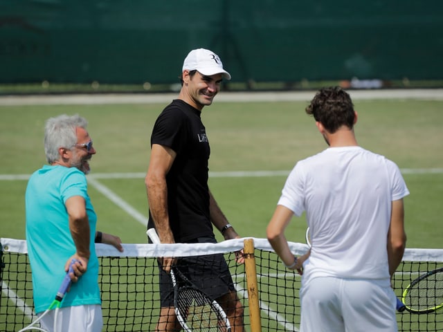 Roger Federer schlug ein Paar Bälle mit dem Österreicher. Roger Federer schlug ein Paar Bälle mit dem Österreicher.