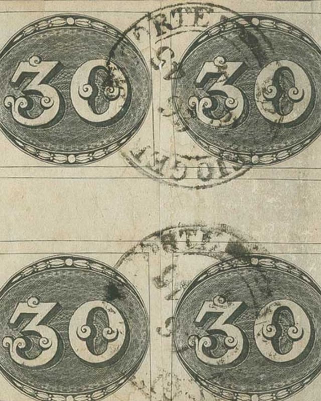 Vierer-Block von Ochsenaugen-Briefmarken. Vierer-Block von Ochsenaugen-Briefmarken.
