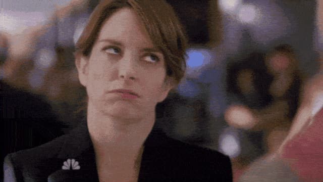 Tina Fey rollt in ihrer Rolle als Liz Lemon dramatisch mit den Augen. Tina Fey rollt in ihrer Rolle als Liz Lemon dramatisch mit den Augen.