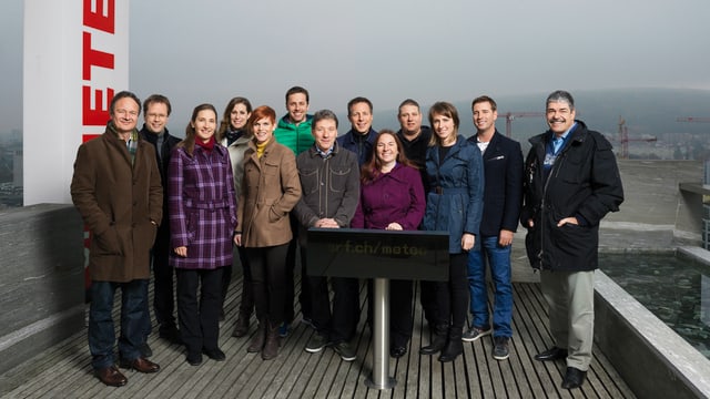 Team von Meteorologen auf dem Dach des Schweizer Fernsehens. Team von Meteorologen auf dem Dach des Schweizer Fernsehens.