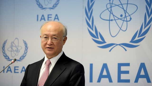 IAEA-Chef Amano vor dem Logo der Behörde. IAEA-Chef Amano vor dem Logo der Behörde.