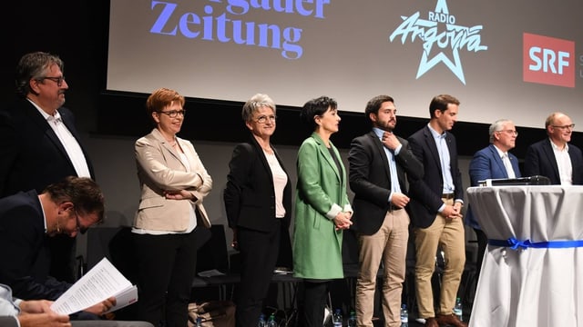 Alle Teilnehmenden auf dem Podium Alle Teilnehmenden auf dem Podium