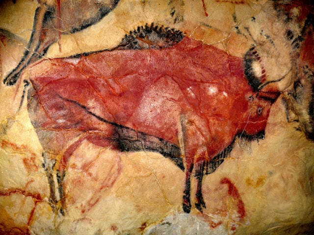 Eine Höhlenmalerei zeigt einen Bison. Eine Höhlenmalerei zeigt einen Bison.