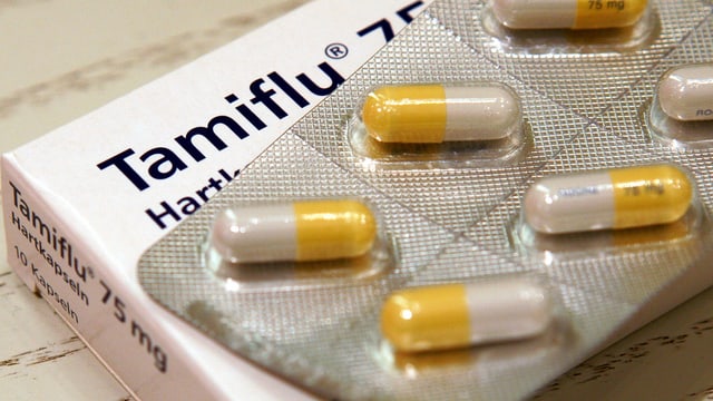 Eine Packung Tamiflu von Roche, gelb-weisse Kapseln. Eine Packung Tamiflu von Roche, gelb-weisse Kapseln.