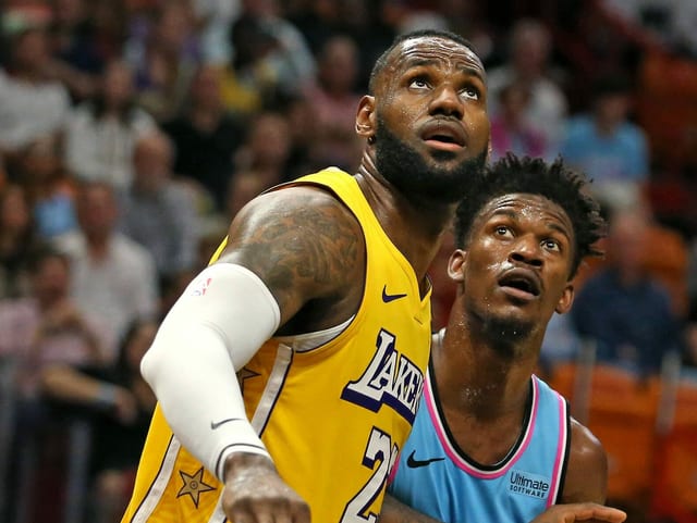 Lakers-Superstar LeBron James und Jimmy Butler von den Miami Heat. Lakers-Superstar LeBron James und Jimmy Butler von den Miami Heat.