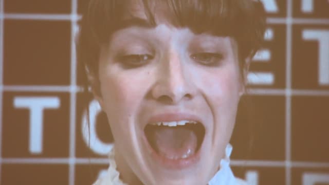 Ein Frau mit offenem Mund in der Nahaufnahme. Ein Frau mit offenem Mund in der Nahaufnahme.