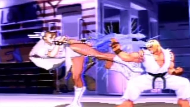 Ken blockt die Tritte von Chun-Li. Ken blockt die Tritte von Chun-Li.