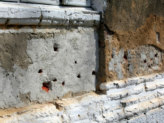 Einschusslöcher in der Wand