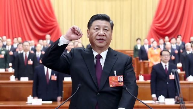 Xi Jinping am Rednerpult. Xi Jinping am Rednerpult.