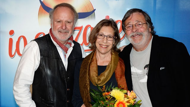 Peter, Sue & Marc posieren vor dem Musicalplakat «io senza te». Peter, Sue & Marc posieren vor dem Musicalplakat «io senza te».