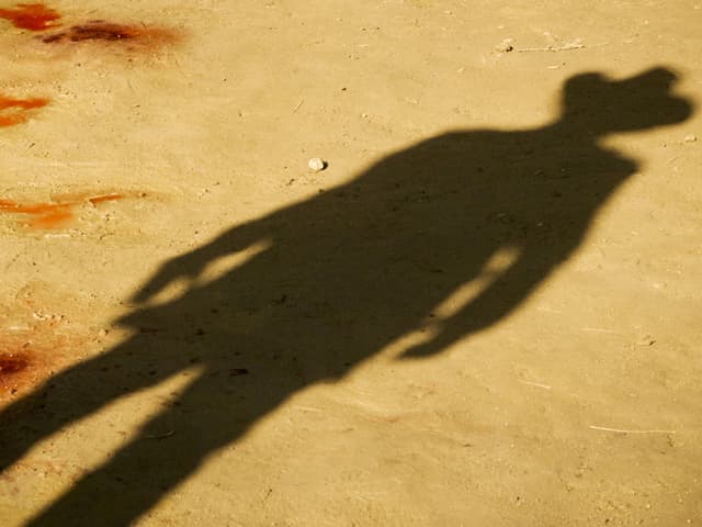 Der Schatten eines Cowboys, Blutflecken im Wüstensand Der Schatten eines Cowboys, Blutflecken im Wüstensand