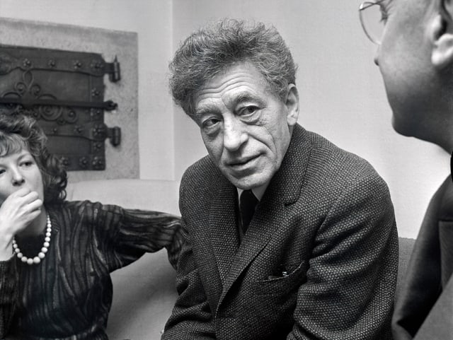 Der Schweizer Künstler Alberto Giacometti in einer Schwarzweiss-Aufnahme. Der Schweizer Künstler Alberto Giacometti in einer Schwarzweiss-Aufnahme.