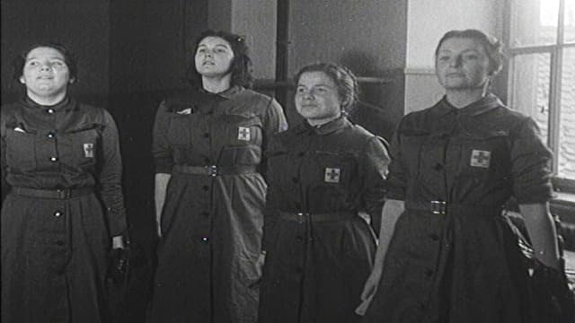Dunnas dal detaschament da la crusch cotschna il 1941. Dunnas dal detaschament da la crusch cotschna il 1941.