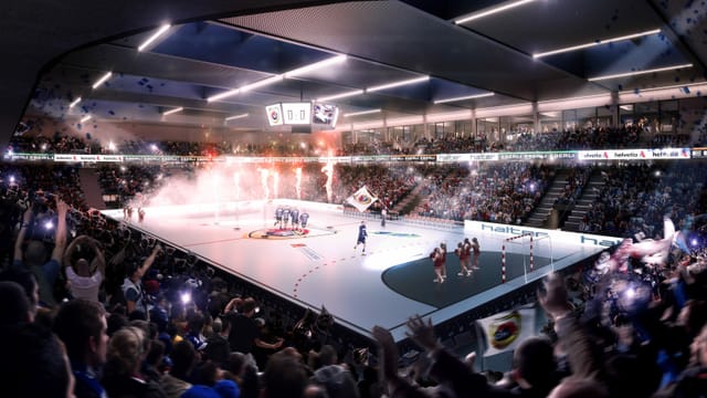 Blick in die geplante Sporthalle mit Handballspielern auf dem Feld und viel Publikum. Blick in die geplante Sporthalle mit Handballspielern auf dem Feld und viel Publikum.