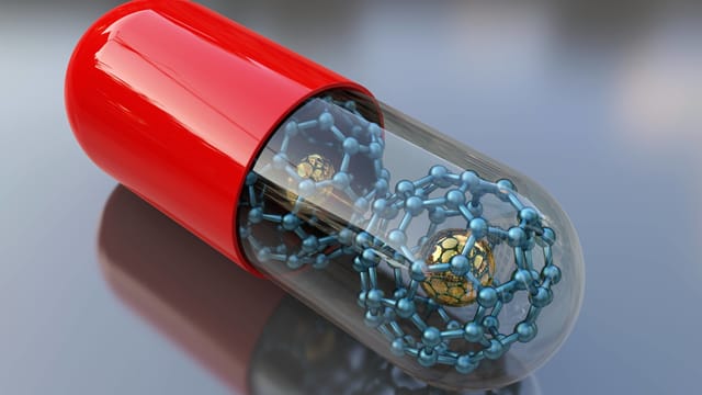 Pille mit Atomkügelchen drin Pille mit Atomkügelchen drin
